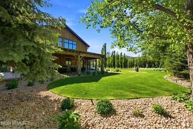 Nestled on an extraordinary 1.17-acre parcel in the charming - photo 5