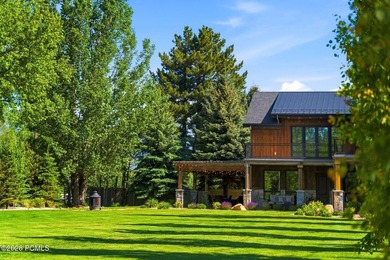 Nestled on an extraordinary 1.17-acre parcel in the charming - photo 6