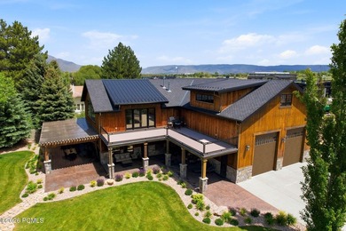 Nestled on an extraordinary 1.17-acre parcel in the charming - photo 10