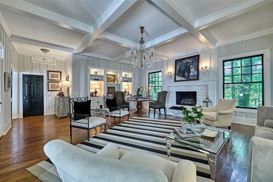 Located in Downtown Cashiers, NC this Stunning 4 Bedroom 4 1/2