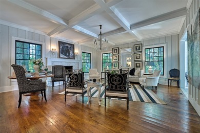 Located in Downtown Cashiers, NC this Stunning 4 Bedroom 4 1/2