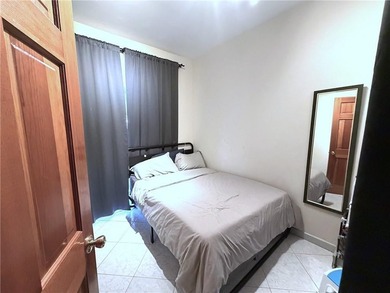 Located in a prime Gravesend location, this solid three-story - photo 9