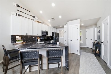 BEAUTIFULLY RENOVATED: Spectacular Lake Hudson views await in - photo 11