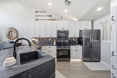 BEAUTIFULLY RENOVATED: Spectacular Lake Hudson views await in - photo 12