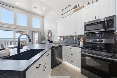 BEAUTIFULLY RENOVATED: Spectacular Lake Hudson views await in - photo 13