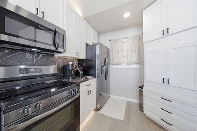 BEAUTIFULLY RENOVATED: Spectacular Lake Hudson views await in - photo 15