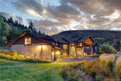 Set on over 15 acres with sweeping valley views, this Cove - photo 1