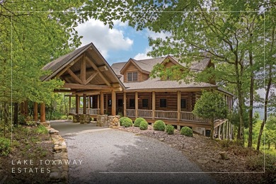 Perched atop over 12 secluded acres, this majestic log cabin - photo 1