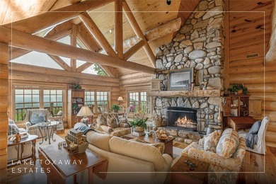 Perched atop over 12 secluded acres, this majestic log cabin - photo 2