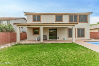 A 5-bed, 3-bath home in the Villages at Queen Creek with 3,237 - photo 4