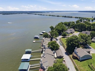 BEAUTIFULLY RENOVATED: Spectacular Lake Hudson views await in - photo 35