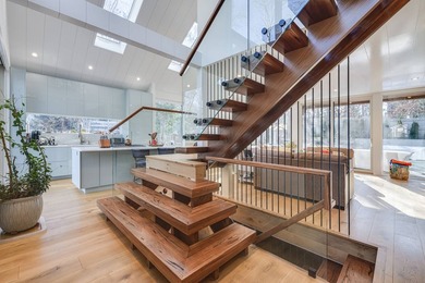 Just moments from the beach, this architecturally striking East - photo 7
