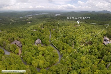Perched atop over 12 secluded acres, this majestic log cabin - photo 8