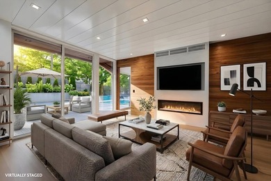 Just moments from the beach, this architecturally striking East - photo 8