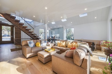 Just moments from the beach, this architecturally striking East - photo 10
