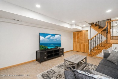 Welcome to 33 Linda Lane, a beautifully maintained multi-level - photo 8