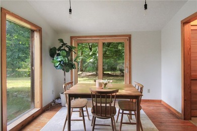 Beautiful contemporary home tucked into the woods with a creek - photo 11