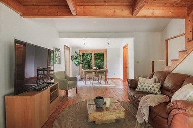 Beautiful contemporary home tucked into the woods with a creek - photo 13