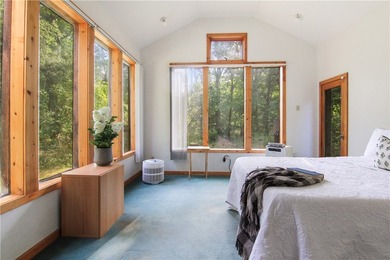 Beautiful contemporary home tucked into the woods with a creek - photo 16