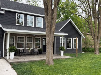 If you've been dreaming of lake living, this stunning home on - photo 2