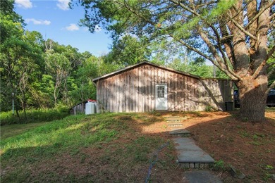 Beautiful contemporary home tucked into the woods with a creek - photo 23