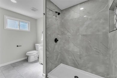 Welcome home to this fully remodeled gem in Keego Harbor with - photo 28
