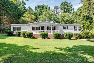 Charming one-level home nestled on a quiet street with numerous - photo 1