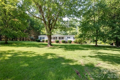 Charming one-level home nestled on a quiet street with numerous - photo 2