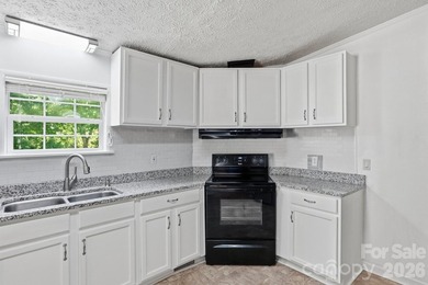 Charming one-level home nestled on a quiet street with numerous - photo 9