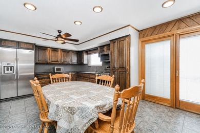 Welcome to 509 Eltingville Blvd, a charming single-family home - photo 6