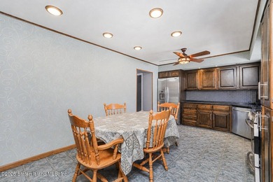 Welcome to 509 Eltingville Blvd, a charming single-family home - photo 7