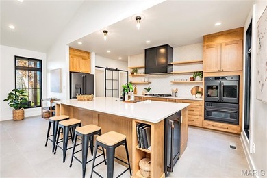 Stunning custom-built ranch home situated on 4.8 acres, just