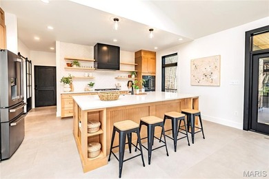 Stunning custom-built ranch home situated on 4.8 acres, just