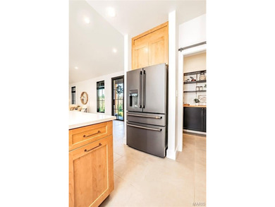 Stunning custom-built ranch home situated on 4.8 acres, just