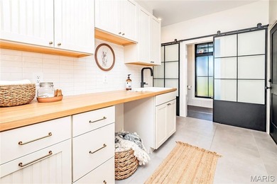 Stunning custom-built ranch home situated on 4.8 acres, just