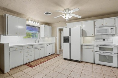 Welcome home to this spacious and inviting property offering an - photo 17