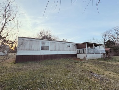 Located at 25 Don Grider Road in Russell Springs, KY, this 2005