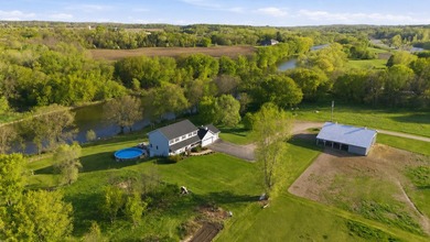 Nestled on almost 7 picturesque acres with 350 feet of stunning - photo 1