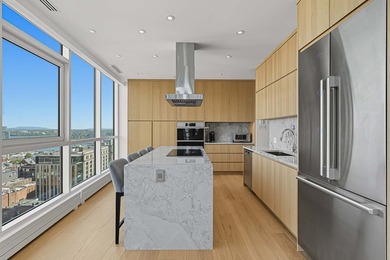 OCCASION RARE. Ce penthouse de 4 chambres, entierement renove - photo 13