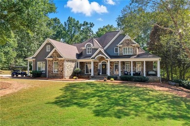 Discover one of McDonough's most exclusive gated estates, where - photo 1