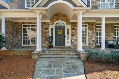 Discover one of McDonough's most exclusive gated estates, where - photo 4