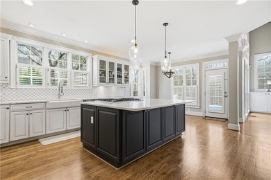 Discover one of McDonough's most exclusive gated estates, where - photo 10