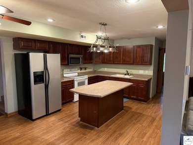 Enjoy the lake lifestyle in this spacious 4-bedroom, 2-bath home - photo 7