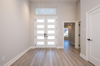 Step inside this custom-built 4-bedroom, 2.5-bath home, where