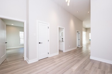 Step inside this custom-built 4-bedroom, 2.5-bath home, where