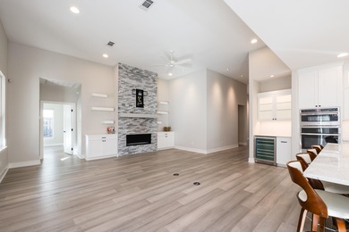 Step inside this custom-built 4-bedroom, 2.5-bath home, where