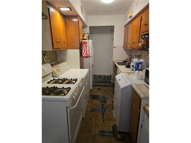 Welcome to 1410 East 89th Street, a solid two-family brick home - photo 8