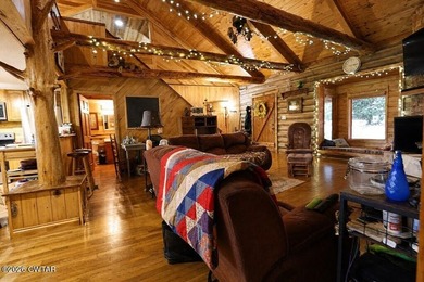 You're in luck-this charming rustic log cabin offers ample space - photo 8