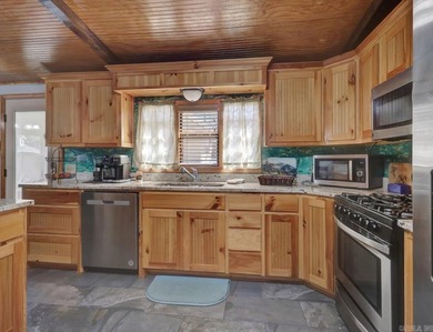 Lakefront Living Meets Total Utility: Interior: Knotty Pine - photo 12