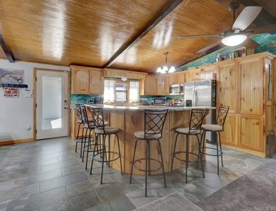 Lakefront Living Meets Total Utility: Interior: Knotty Pine - photo 15
